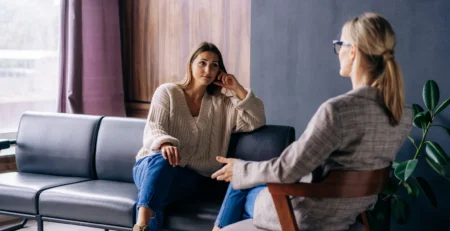 Therapist meeting with a patient to discuss mental health and substance use concerns